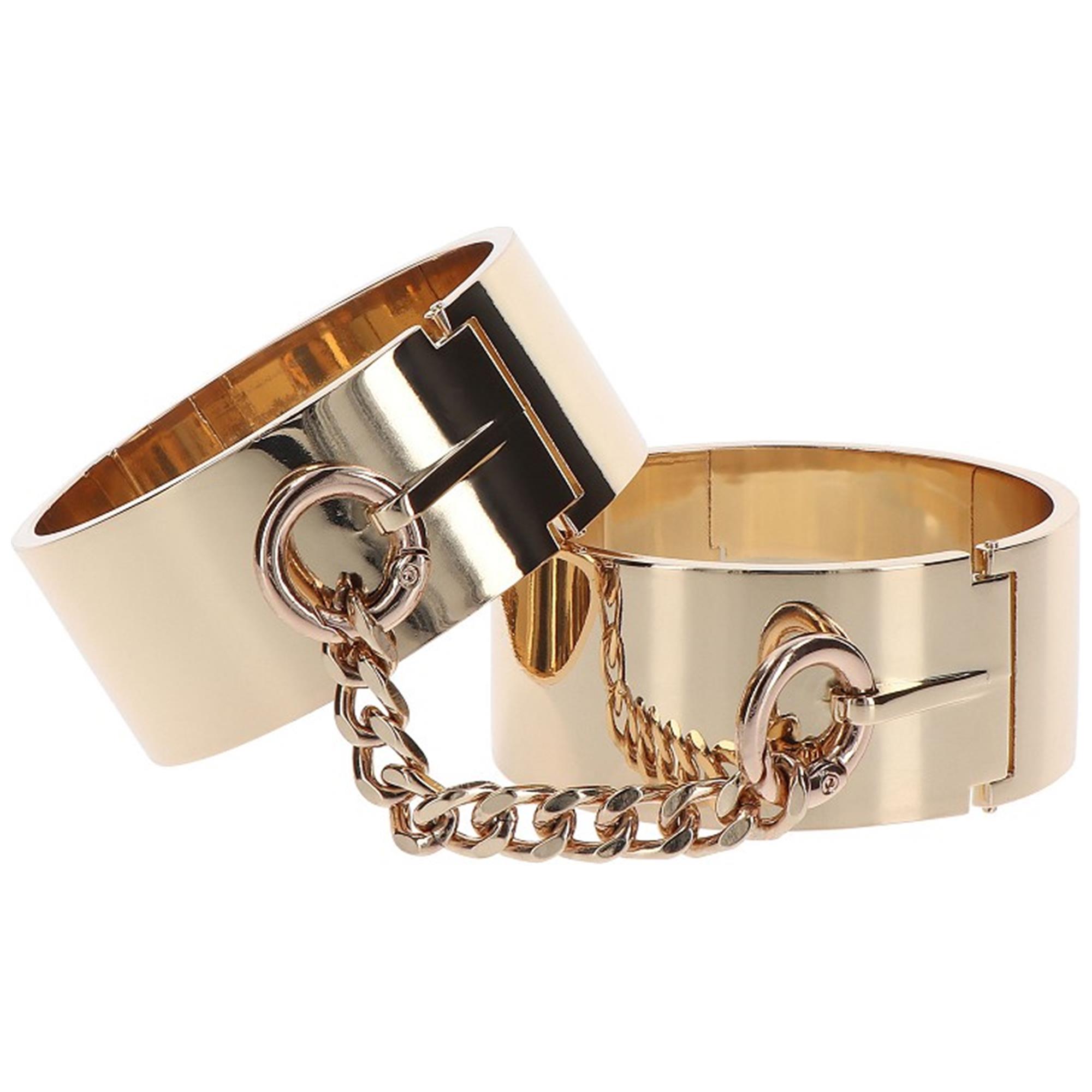 Slave Wrist Cuffs Rose Gold från TABOOM, glänsande roséguldfärgade metall-handbojor