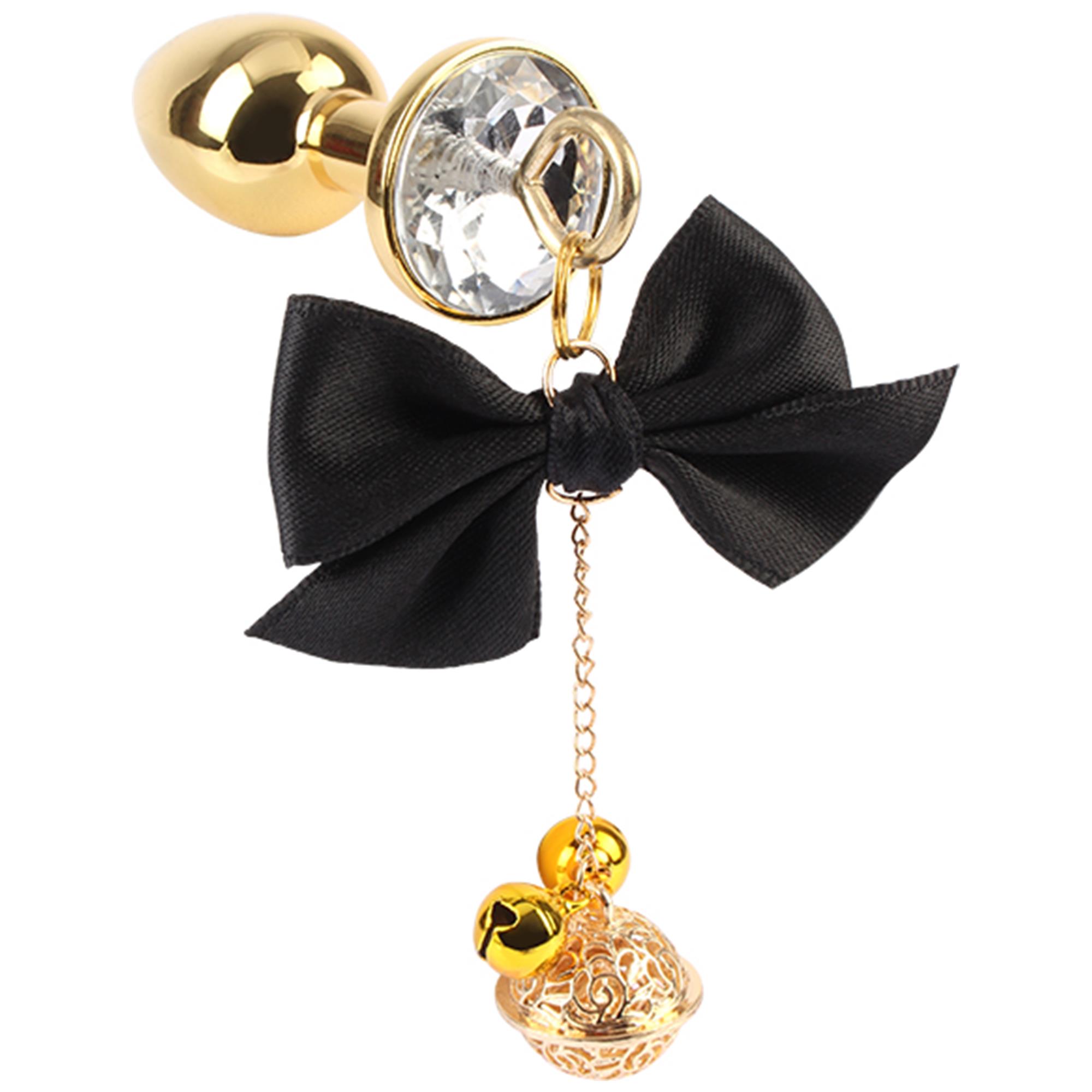 Sexy Tempter Kit Black från Senuelo, buttplug och bröstvårtsklämor med rosetter och gulddetaljer