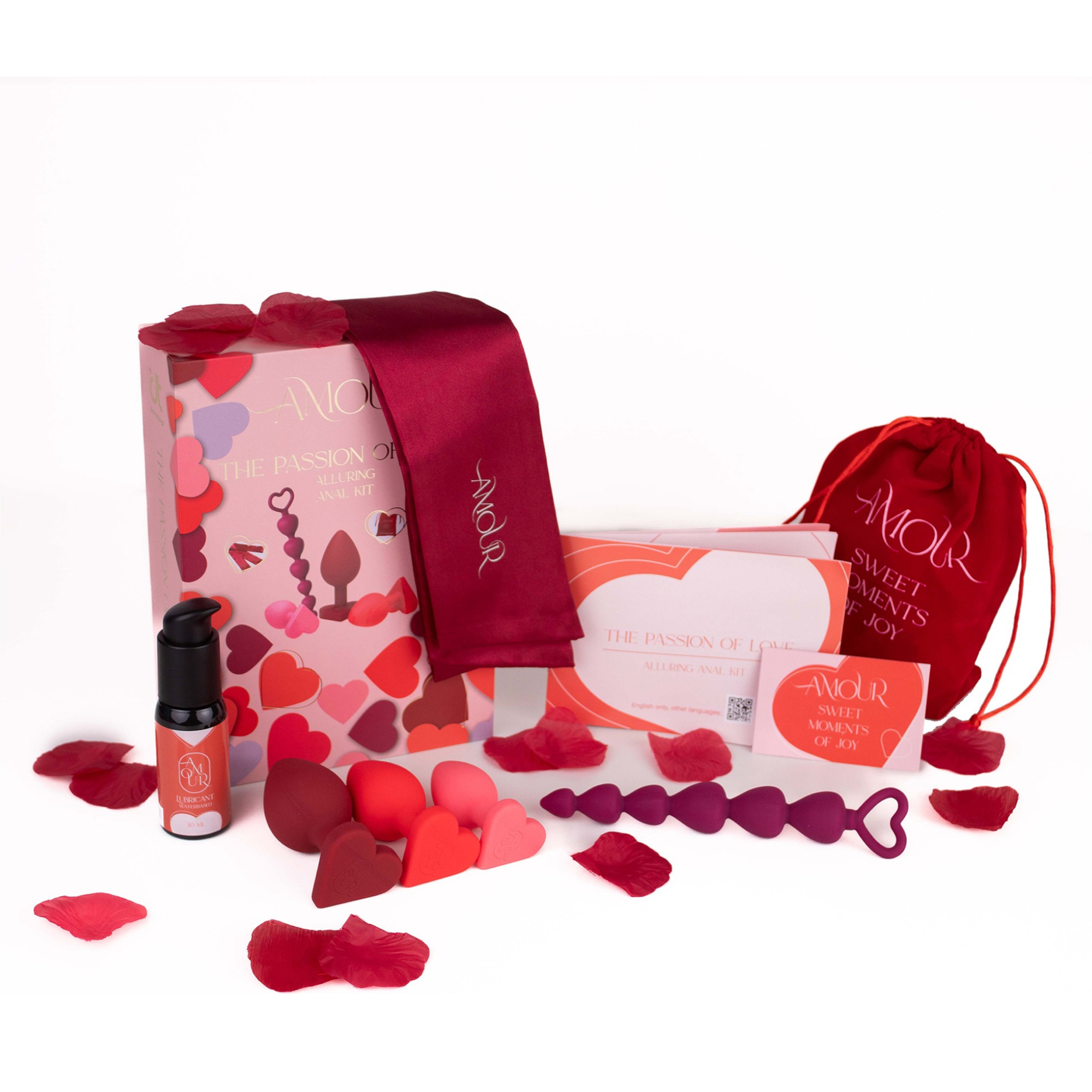 Dreamtoys Amour Alluring Anal Kit med tre buttplugs, silikonkulor, bondageband och rosenblad i presentask