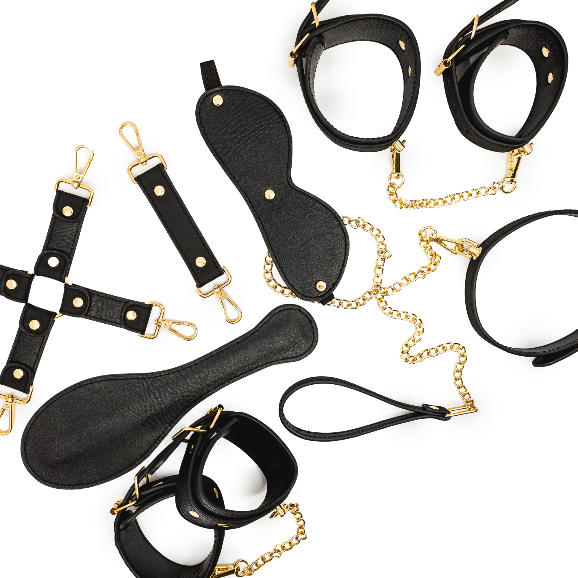 Luxury Fetish Kit från Kitted – komplett bondageset i imitationsläder med guldfärgade detaljer