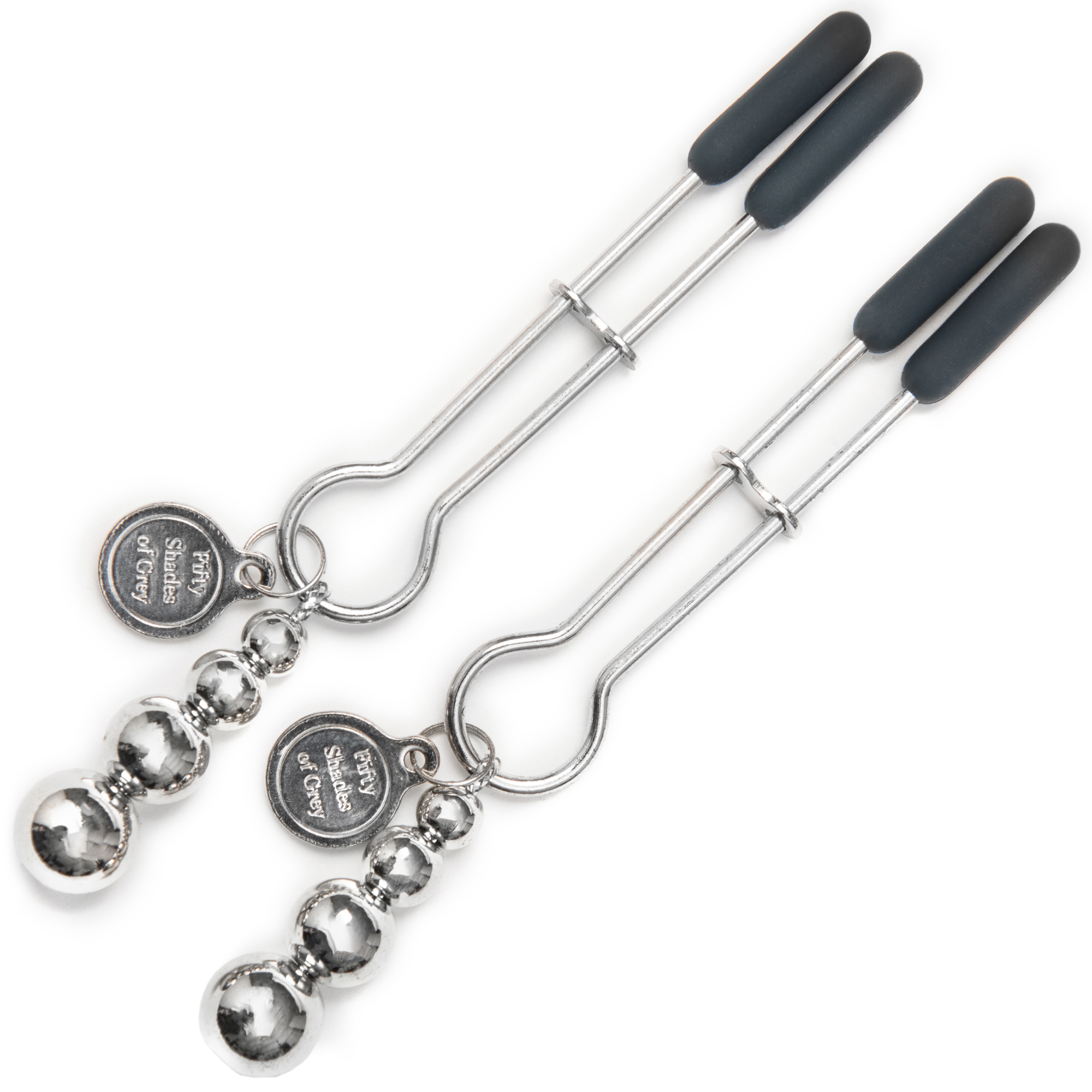 The Pinch nipple clamps från Fifty Shades of Grey med hängande metallvikter och silikonspetsar